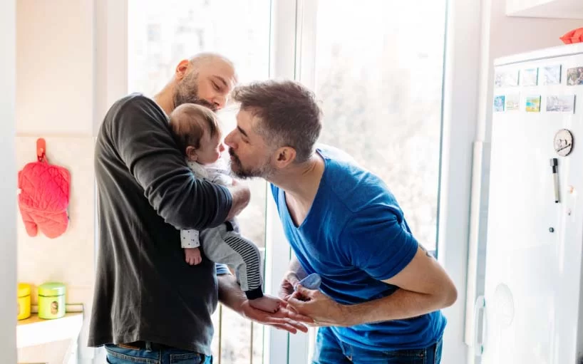 Male couple with baby