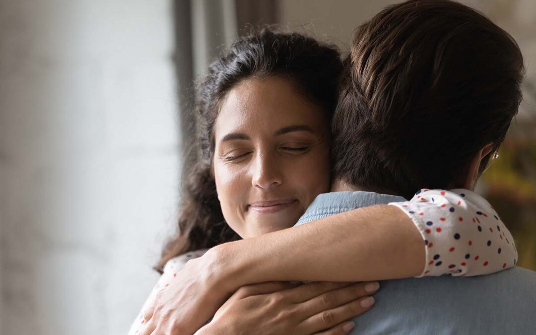 Man and woman hugging