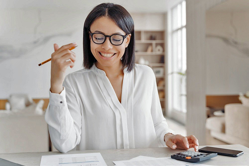 smiling woman at desk